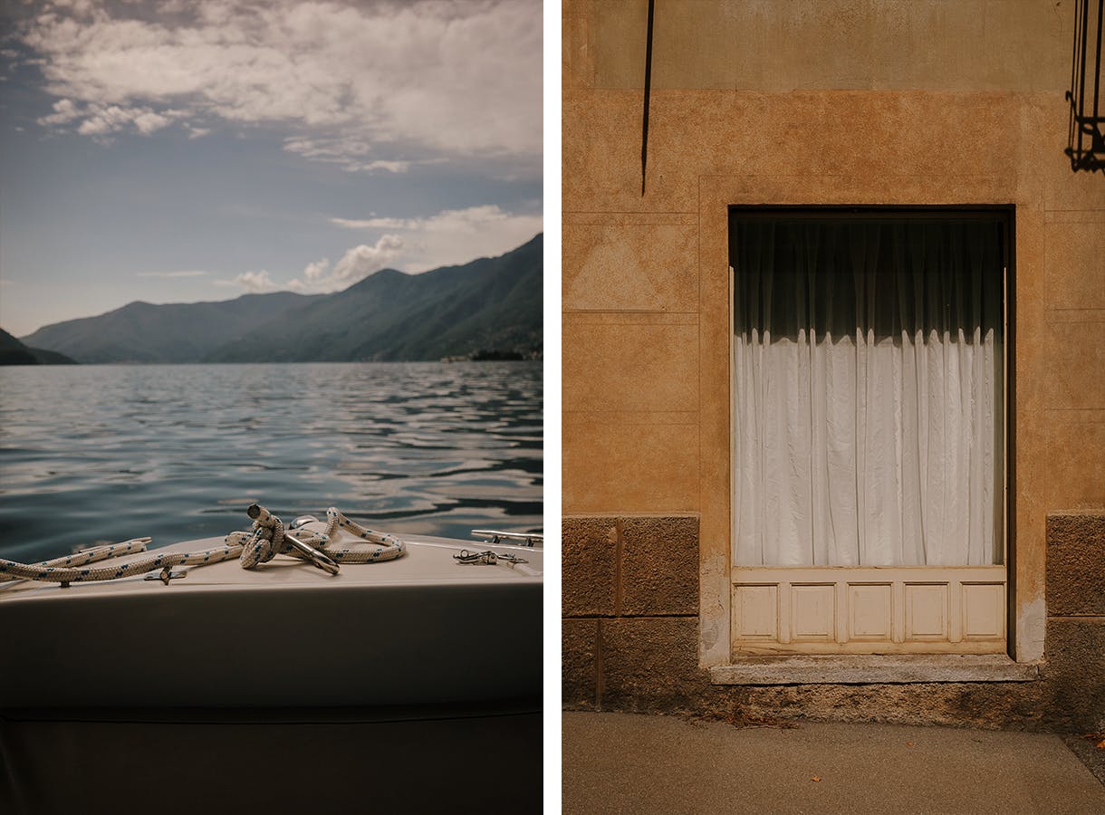 Kleines Boot auf dem Lago Maggiore, Berge im Hintergrund. Hausfassade in Ascona mit geschlossenem weissen Gardienen.