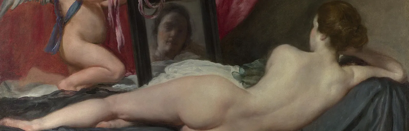 In Velázquez "Venus vor dem Spiegel" liegt eine junge Frau mit dem Rücken zur Betrachterin vor dem Spiegel und betrachtet ihr Bild. Neben dem Spiegel ist Amor zu sehen, der keinen Pfeil hält.