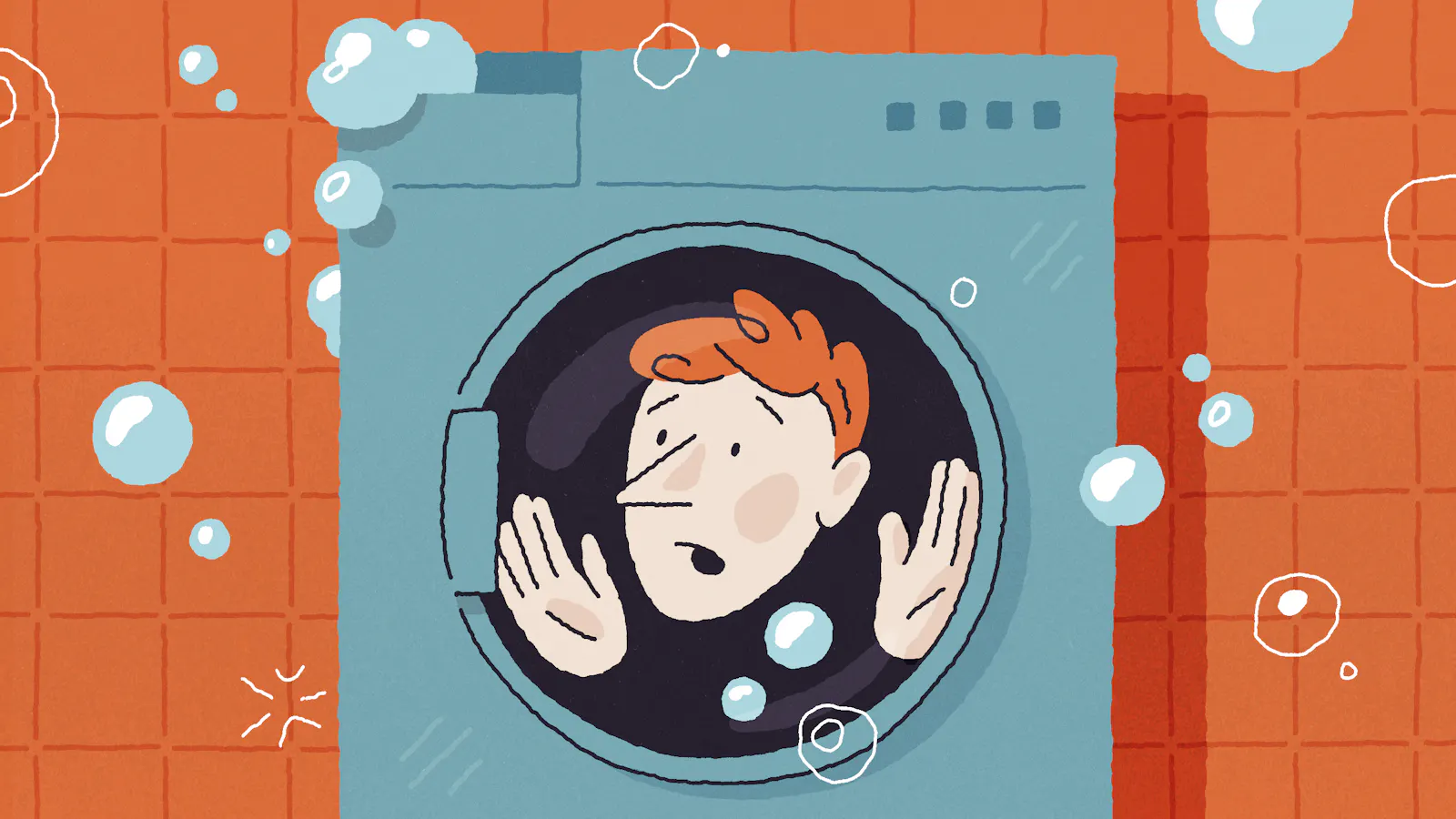 Ein junger Mann in einer Waschmaschine, man sieht sein Gesicht und seine Hände durch das Bullauge.