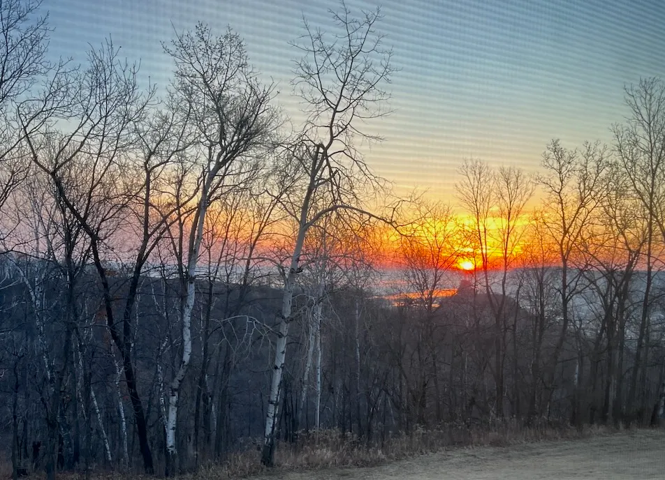 Sunrise over Winona, Minnesota. © John Garth, 2025