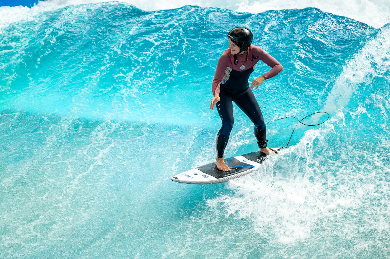 Christine Sing verbindet Coaching und Surfen