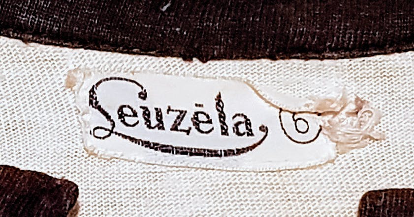 Leuzela Label
