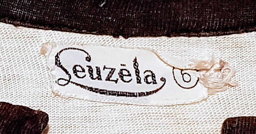 Leuzela Label