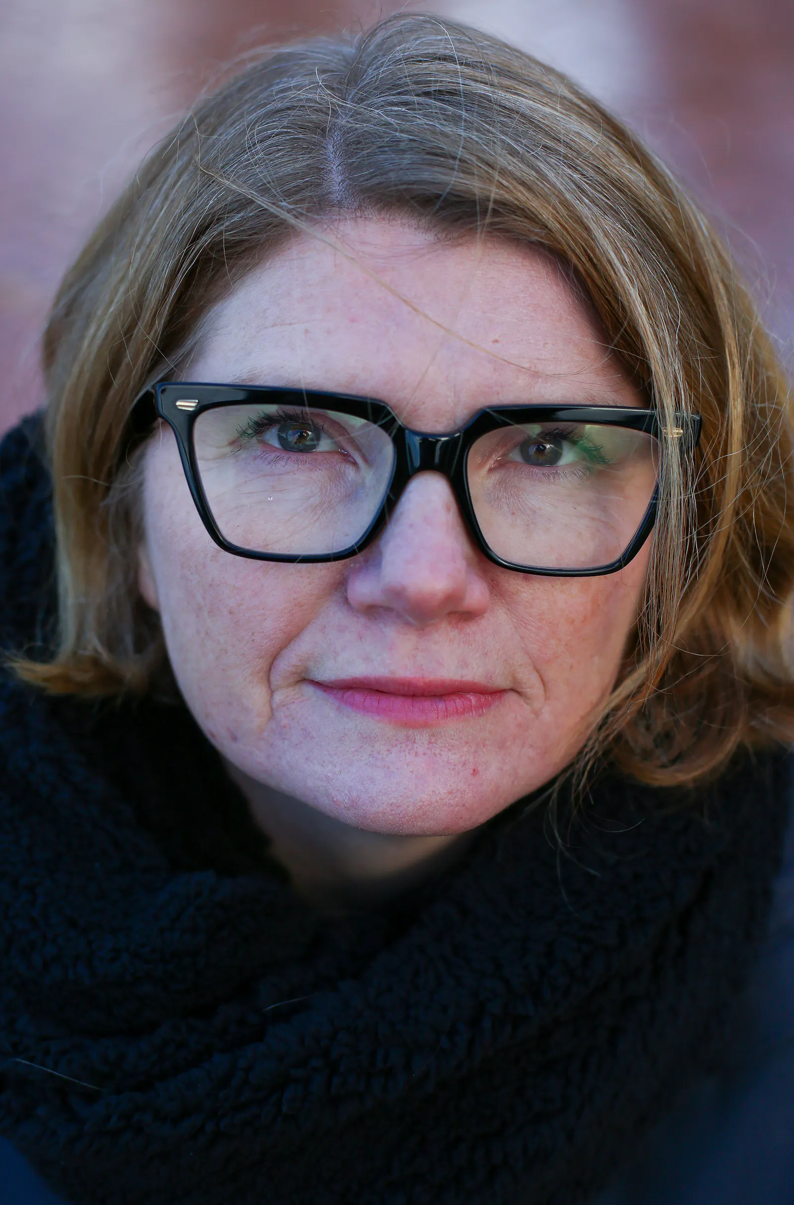 Cathy Rentzenbrink, a fortysomething women with fair hair cut in a bob, freckles and glasses