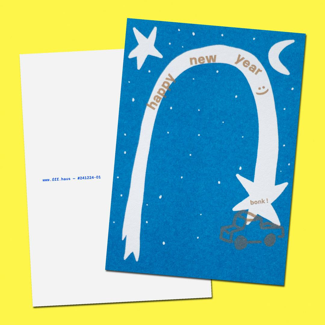 Blue card with a white comet-shaped trail forming an arch and hitting a car with the word 'bonk!' and the text 'happy new year ;)' on it