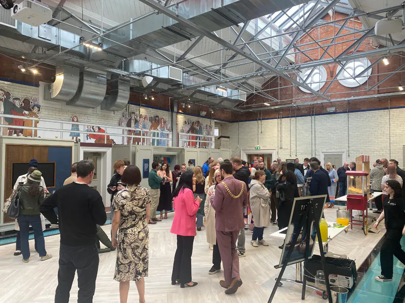 Audience at launch of Eastside Festival in Templemore Baths in east Belfast.