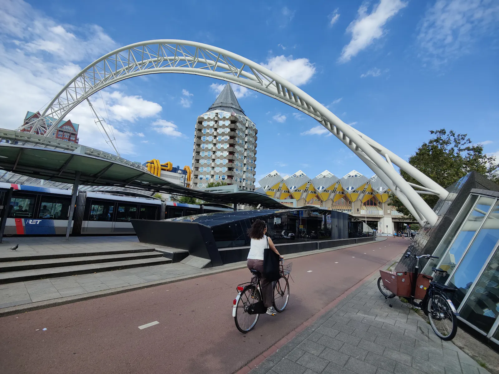 Pencil shaped Blaaktoren, Kubuswoningen, Blaak Station tram stop and a bicycle path | Rijstuin 176, 3011 MD Rotterdam, Netherlands