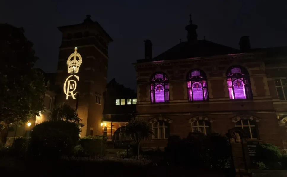 Reigate & Banstead town hall, in Castlefield Road, Reigate, illuminated for the coronation of King Charles III
