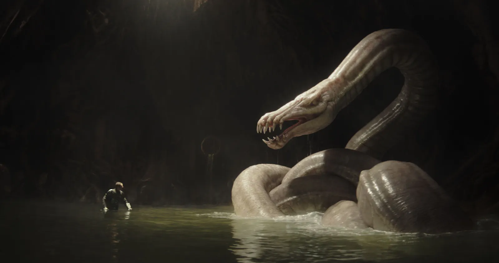 The Mandalorian (Pedro Pascal) and Dragonsnake in Lucasfilm's THE MANDALORIAN AND GROGU. Photo courtesy of Lucasfilm. © 2026 Lucasfilm Ltd™. All Rights Reserved.