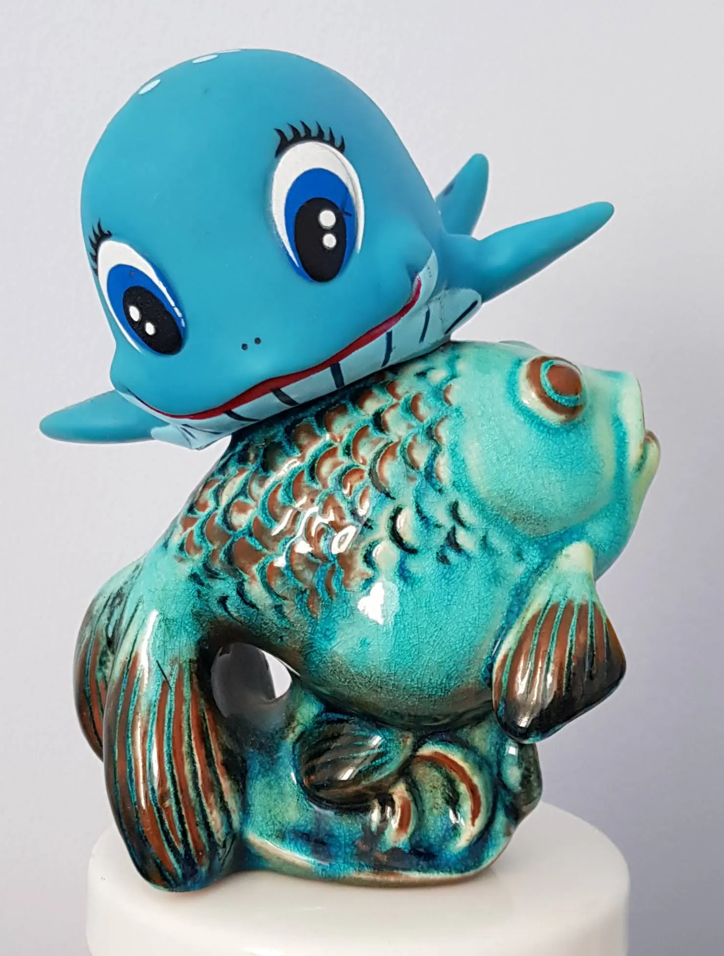 Puky-Fahrradhupe in Fischform auf Keramikfisch