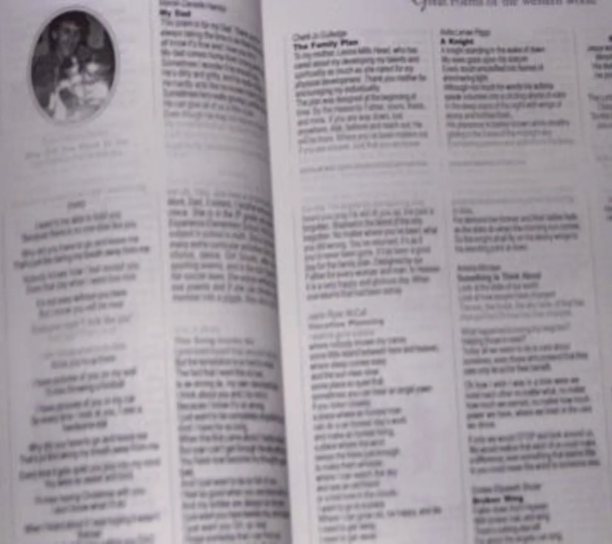 A photograph of the book's interior pages showing half printed poems and large blank spots in the upper third of the page where the printer ran low on ink. Pure garbage.