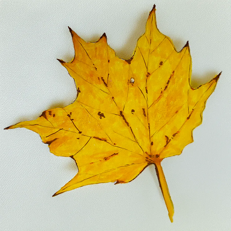 Gezeichnetes Ahornblatt in gelben Herbsttönen.