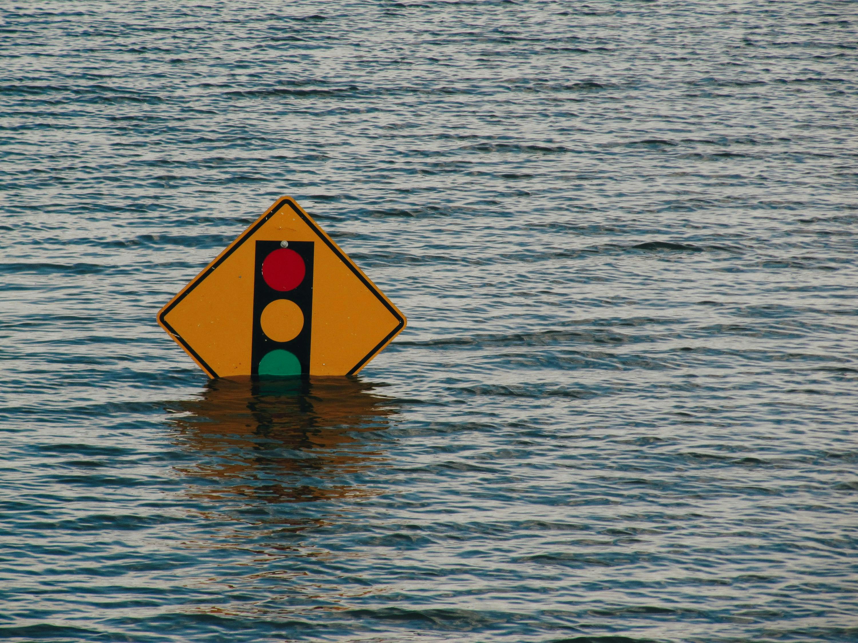 A flooded traffic-light sign in Davenport, Iowa